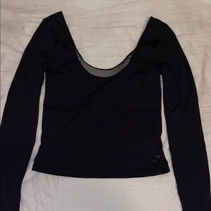 Gymshark Black Long Sleeve Women's Tee (S)
Item sold on another platform.